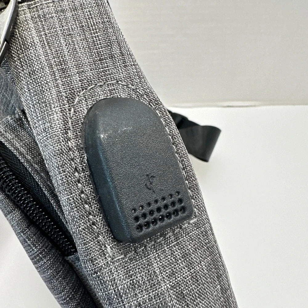 NuPouch Gray Crossbody Sling Bag with USB Charging Port Travel Tech Backpack